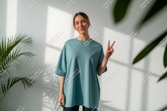 Woman wearing teal t shirt mockup Product Image 1