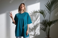 Woman wearing teal t shirt peace sign image Product Image 1