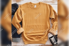 Gold Tshirt Mockup With Jeans And Sneakers On Wooden Product Image 1