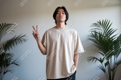 Man wearing beige t-shirt peace sign image Product Image 1