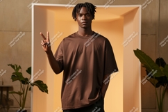 Man wearing brown t shirt peace sign image Product Image 1