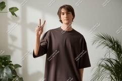 Young man showing peace sign male person Product Image 1
