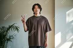 Man wearing brown t shirt peace sign image Product Image 1