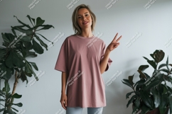 Woman wearing pink t shirt peace sign image Product Image 1