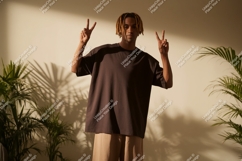 Man wearing dark t shirt peace sign t-shirt Product Image 1