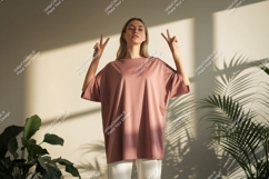 Woman wearing pink t shirt peace sign image Product Image 1