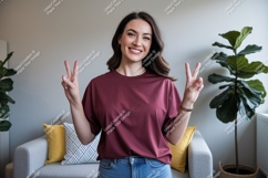 Woman wearing maroon t shirt peace sign image Product Image 1