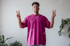Man wearing magenta t shirt peace gesture image Product Image 1