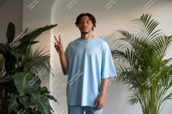 Man wearing light blue t shirt peace sign male person Product Image 1