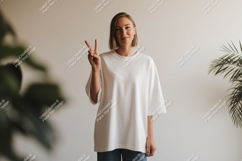 Woman wearing white t shirt peace sign image Product Image 1