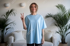 Woman wearing light blue t shirt peace sign image Product Image 1