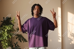 Young man purple shirt peace sign image Product Image 1