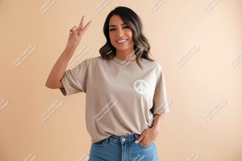 Woman wearing beige t-shirt peace sign jeans image Product Image 1