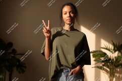 Woman peace sign green shirt image Product Image 1