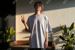 Young man wearing grey t shirt peace sign mockup t-shirt Product Image 1