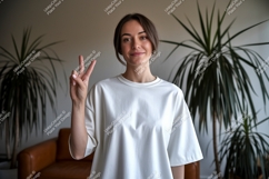 Woman wearing white t-shirt peace sign image Product Image 1