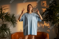 Woman wearing light blue t shirt peace sign image Product Image 1
