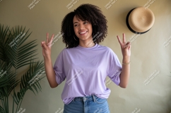 Woman peace sign lavender shirt denim jeans image Product Image 1