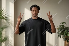 Young man black t-shirt peace sign image Product Image 1