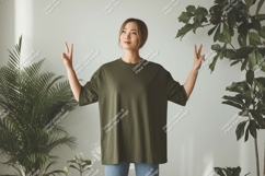 Woman wearing olive green t shirt peace sign image Product Image 1