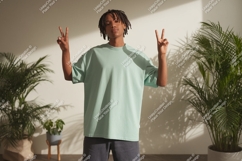 Young man peace gesture mint t shirt male person Product Image 1