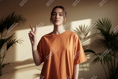 Woman peace sign orange shirt image Product Image 1