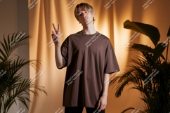 Young man brown t shirt peace sign plants image Product Image 1