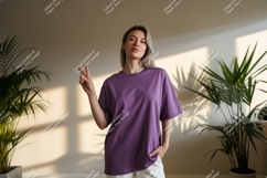 Woman purple t shirt peace sign image Product Image 1