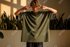 Young man wearing olive green t shirt male Product Image 1