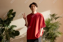 Young man red shirt peace sign plants image Product Image 1