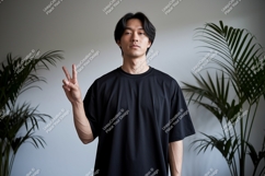 Asian man black shirt peace sign image Product Image 1