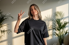 Woman wearing black t shirt peace sign image Product Image 1