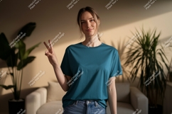 Woman wearing teal t shirt peace sign image Product Image 1