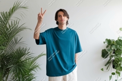 Man wearing teal t shirt peace sign image Product Image 1