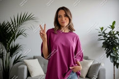 Woman wearing purple t-shirt peace sign Product Image 1