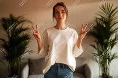Woman white shirt peace sign image Product Image 1