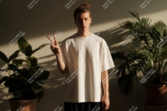 Young man peace sign indoor plants male Product Image 1