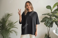 Woman wearing black t shirt peace sign image Product Image 1