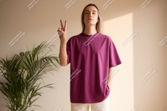 Woman wearing purple t shirt peace sign image Product Image 1