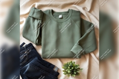 Olive Tshirt Mockup With Jeans And Plant Product Image 1