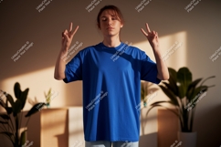 Woman blue shirt peace sign indoor image Product Image 1