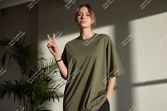 Woman wearing olive green t-shirt peace sign image Product Image 1