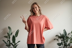 Woman wearing coral t shirt peace sign image Product Image 1