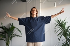 Woman in navy blue t shirt with arms outstretched image Product Image 1
