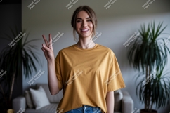 Woman peace sign mustard shirt image Product Image 1