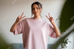 Young Woman Pink T Shirt Peace Sign image Product Image 1