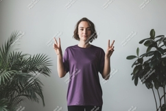 Woman purple shirt peace sign plants image Product Image 1