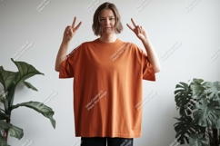 Woman orange shirt peace signs plants image Product Image 1