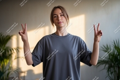 Woman grey t shirt peace sign image Product Image 1