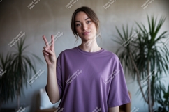 Young woman peace sign purple shirt image Product Image 1
